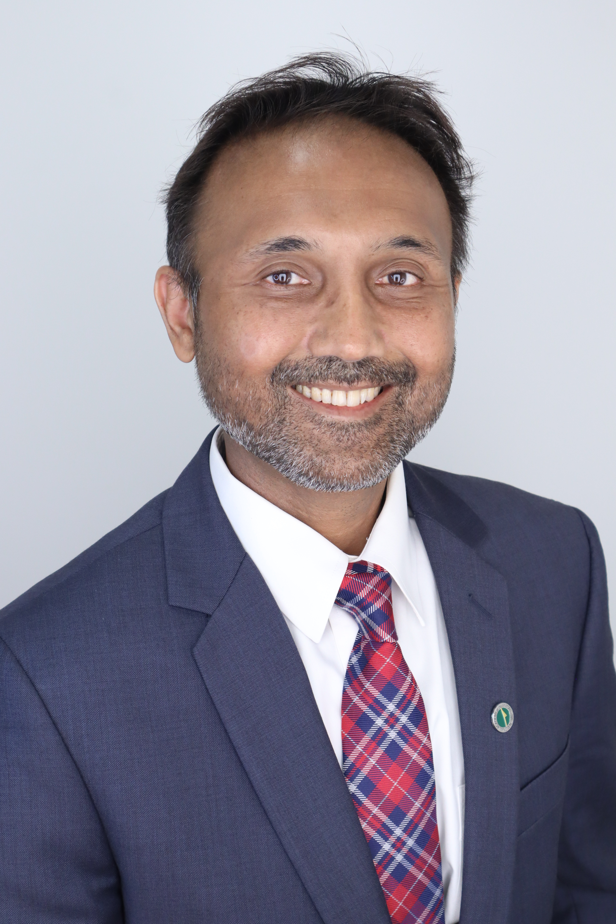 Dr. Harvinder Gill